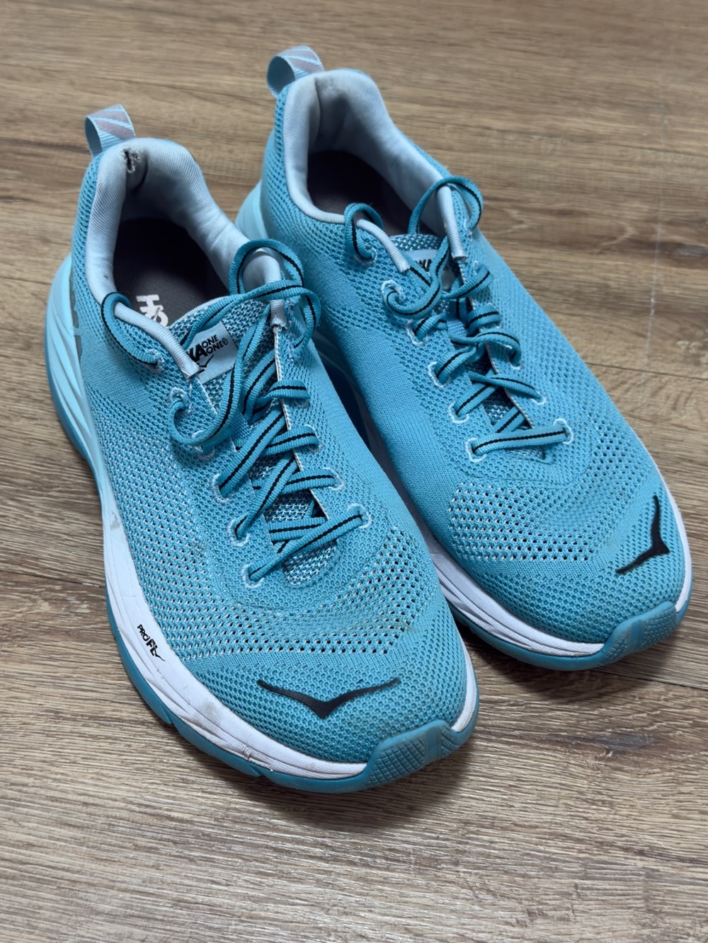 Hoka One One woman’s Athletic Running Shoes in Teal